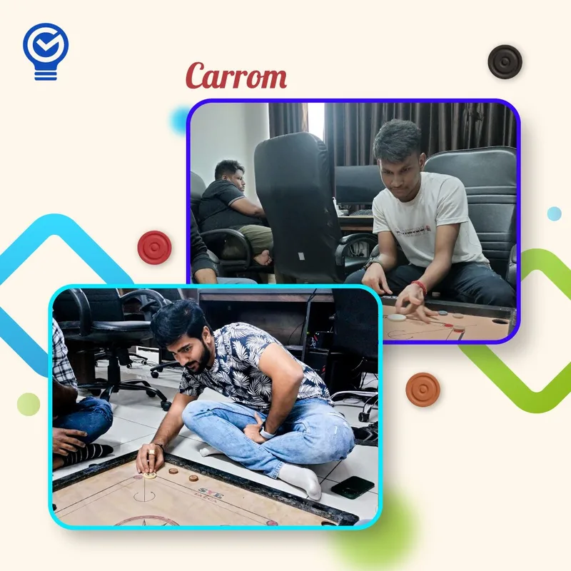 Teammates playing carrom in the office during a team game session